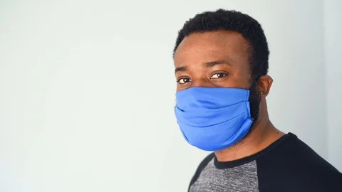 African in blue mask Stock Footage 128740916