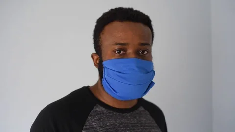 African in blue mask Stock Footage 128740978
