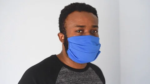 African in blue mask Stock Footage 128741002