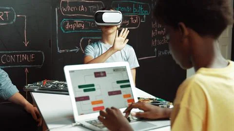 African boy programing system while caucasian girl enter metaverse. Edification. Photos