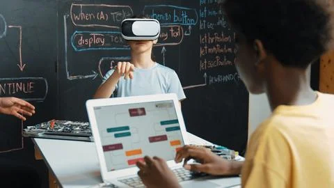 African boy programing system while caucasian girl enter metaverse. Edification. Photos