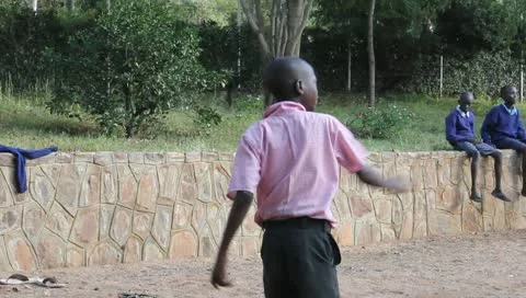 African Boy Serving Volleyball. Stock Footage 10682915