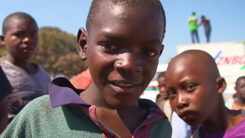 African boy smiling at camera Vídeos de archivo 142370207