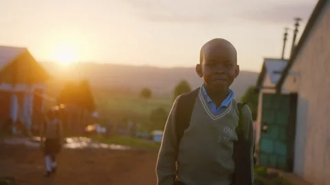 African boy in sunset Stock Footage 79640626
