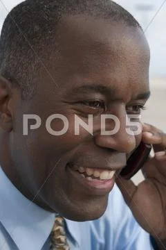 African Businessman Talking On Cell Phone