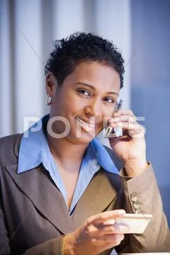 African Businesswoman Talking On Cell Phone