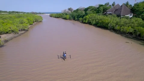 African canoe on river Stock Footage 264753523
