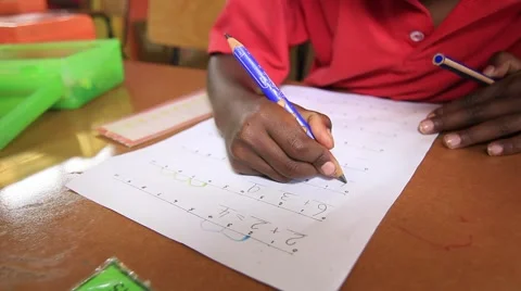 African child doing maths in classroom Stock Footage 43971205