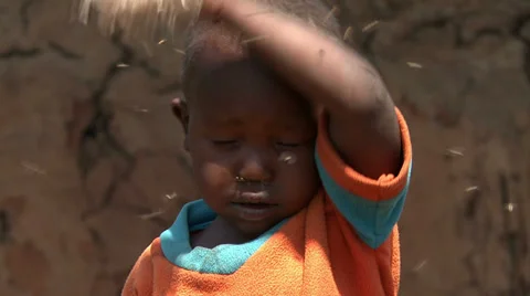 African child with flies Video stock 33688921