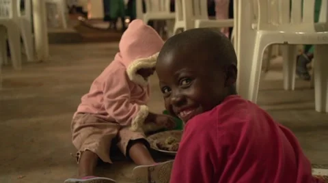 African Child Smiling at Camera in Slow Motion, Uganda Stock Footage 40929667