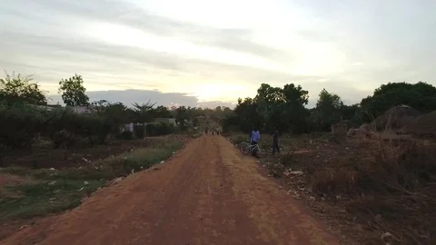 African Children fetching dirty drinking water using bottles to fill sour water Stock Footage 88018142