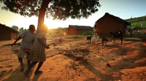 African children playing near a village in Kenya Stock Footage