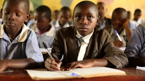 African children in a primary (elementary) school in Uganda, Africa Stock Footage