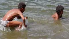 boy swimming in river