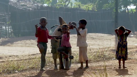 African chilren in afternoon light Stock Footage 248833512