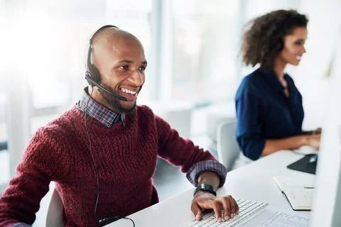 African, computer or happy man in call centre, telecom or tech support for Foto stock