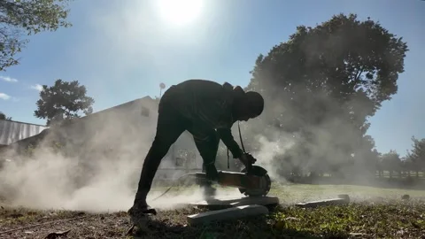 African Construction Site, Stone Grinder Slow Motion Dust Slow Push In Vídeo Stock 337735486