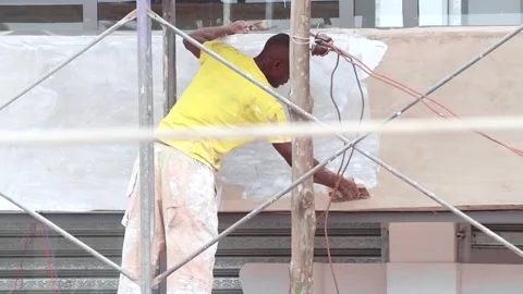 African Construction worker at work.  Stock Footage 249911650