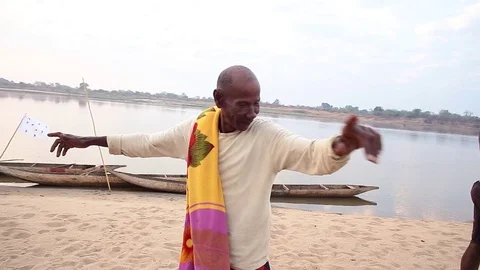 African dancing on riverbank Stock Footage 76024558