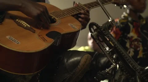African Disabled Man Playing the Guitar in Kabale, Uganda Stock Footage 40928993