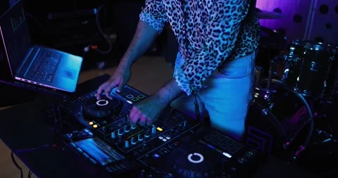 African dj man dancing while mixing music inside recording studio Stock Footage 153404838