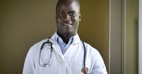 African doctor smiles. concept of medicine in the world Stock Footage