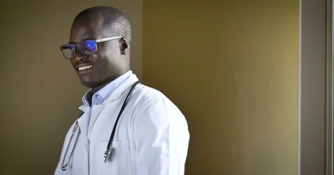 African doctor smiles. concept of medicine in the world Stock Footage