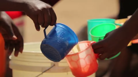 African drink being distributed for pupils in class Vídeo Stock 57949242