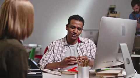 African Engineer and Colleague Testing Puzzle Game Stock Footage 68557786