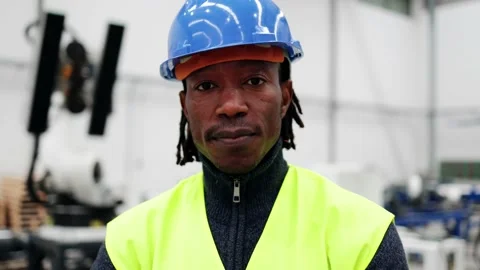 African engineer working at ai robotic automation warehouse - Innovation Stock Footage 230245269