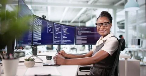 African Female Coder Working On Web Development Project With Computer. 스톡 사진