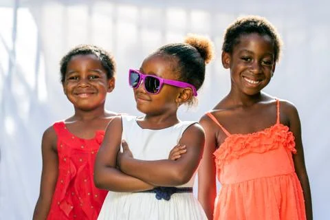 African girl wearing fun sunglasses. Stock Photos