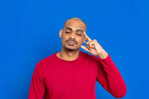 African guy on a blue background Foto stock