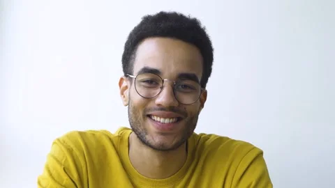 African guy smiles confidently Stock Footage 164837903