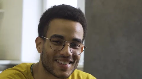 African guy smiles confidently Stock Footage 179965271