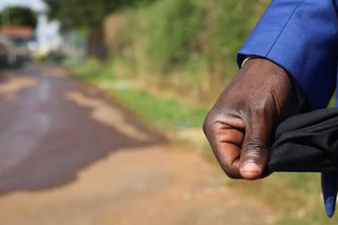 The African hand showing empty pockets Stock Photos