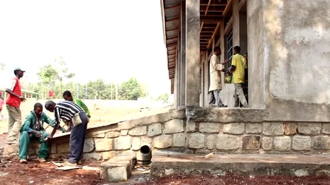 African hard worker bricklayer school - Etiopia, Africa Stock Footage 151423856