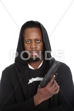 African hooligan or gangster with a gun Stock Photos