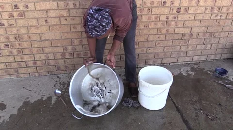 African Lady cleaning Stock Footage 55088558