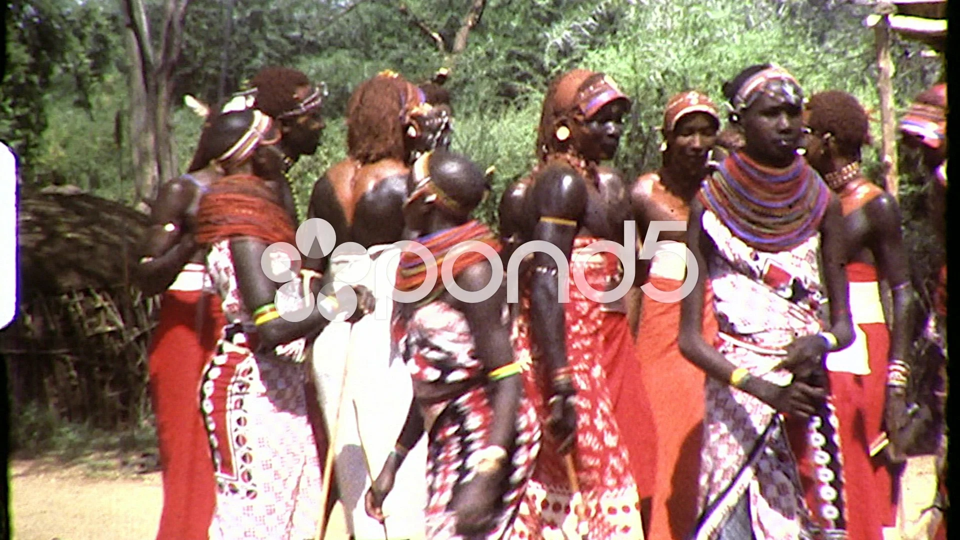 Maasai warrior in traditional dress hi-res stock photography and