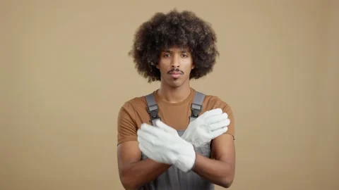 African man carpentry worker looking at camera in work uniform Stock Footage 231036787