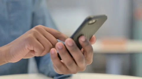 African Man Hands Using Smartphone, Close Up Stock Footage 146482720
