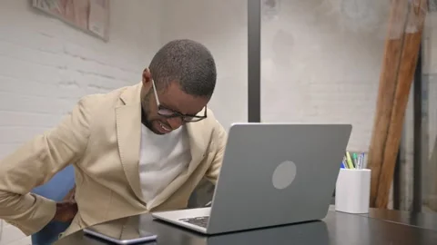 African Man having Back Fatigue and Pain Video stock 305628760