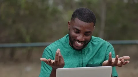 African Man with Laptop, interacts with colleagues and professor, online class. Stock Footage 345506295