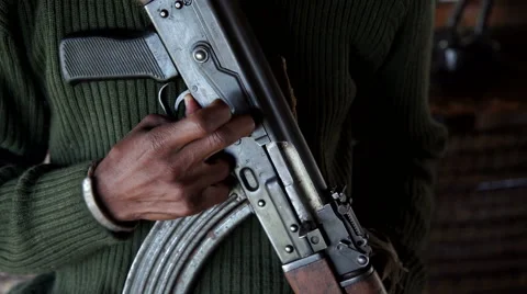 An African man with a machine gun in his hand. Stock-Footage 67418751