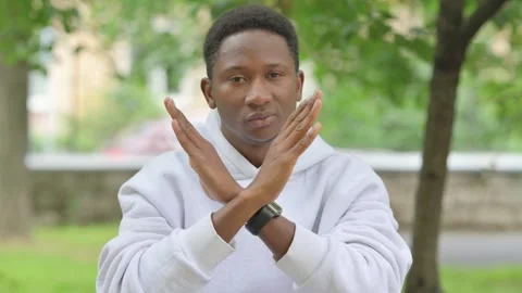 African Man Making Stop Gesture Outdoors, Portrait Stock Footage 311847287