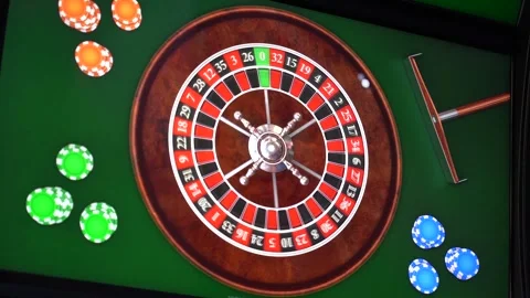 African man playing a game of roulette on a slot machine Stock Footage 256794000