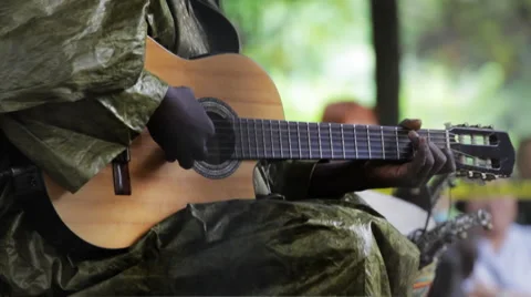 African Man Plays  String Guitar CU Stock Footage 58583335