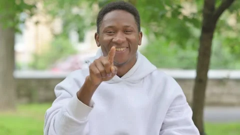 African Man Pointing Directly at Viewer Outdoors, Portrait Stock Footage 311847710