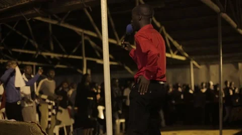 African Man Singing and Dancing in Church in Kabale, Uganda Stock Footage 40910881